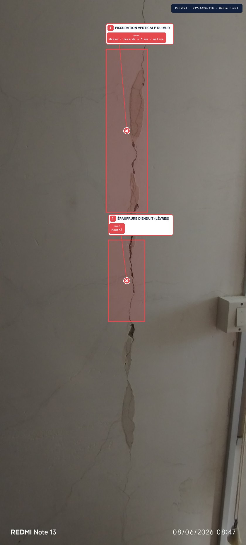 Exemple de constat Konstat sur photo réelle : fissure murale annotée, comparatif site vs requis et référence DTU
